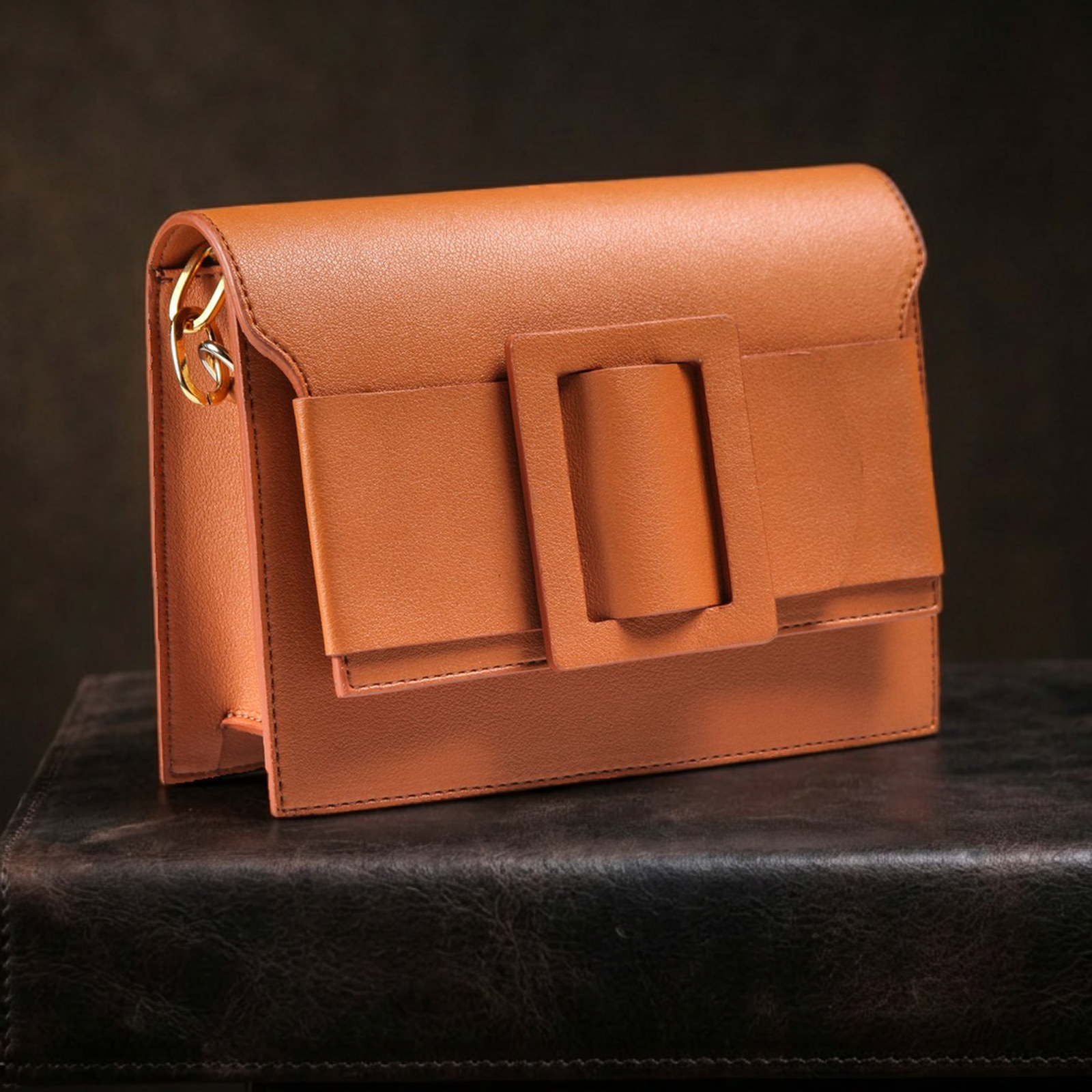 after: AI photoshoot of shoes & bags in dark leather