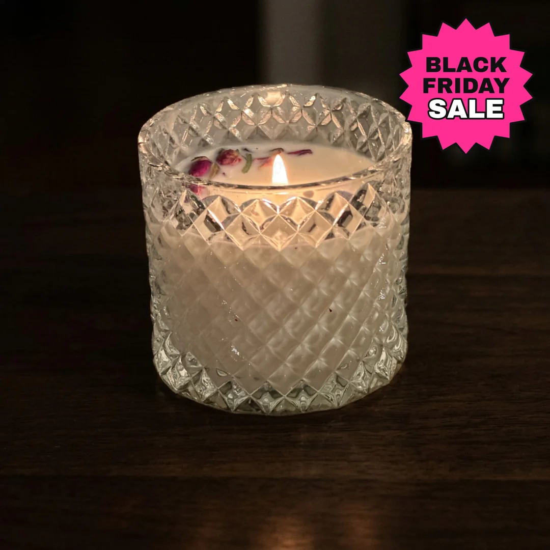 Candle in an AI photoshoot scene with a pink Black Friday sale starburst