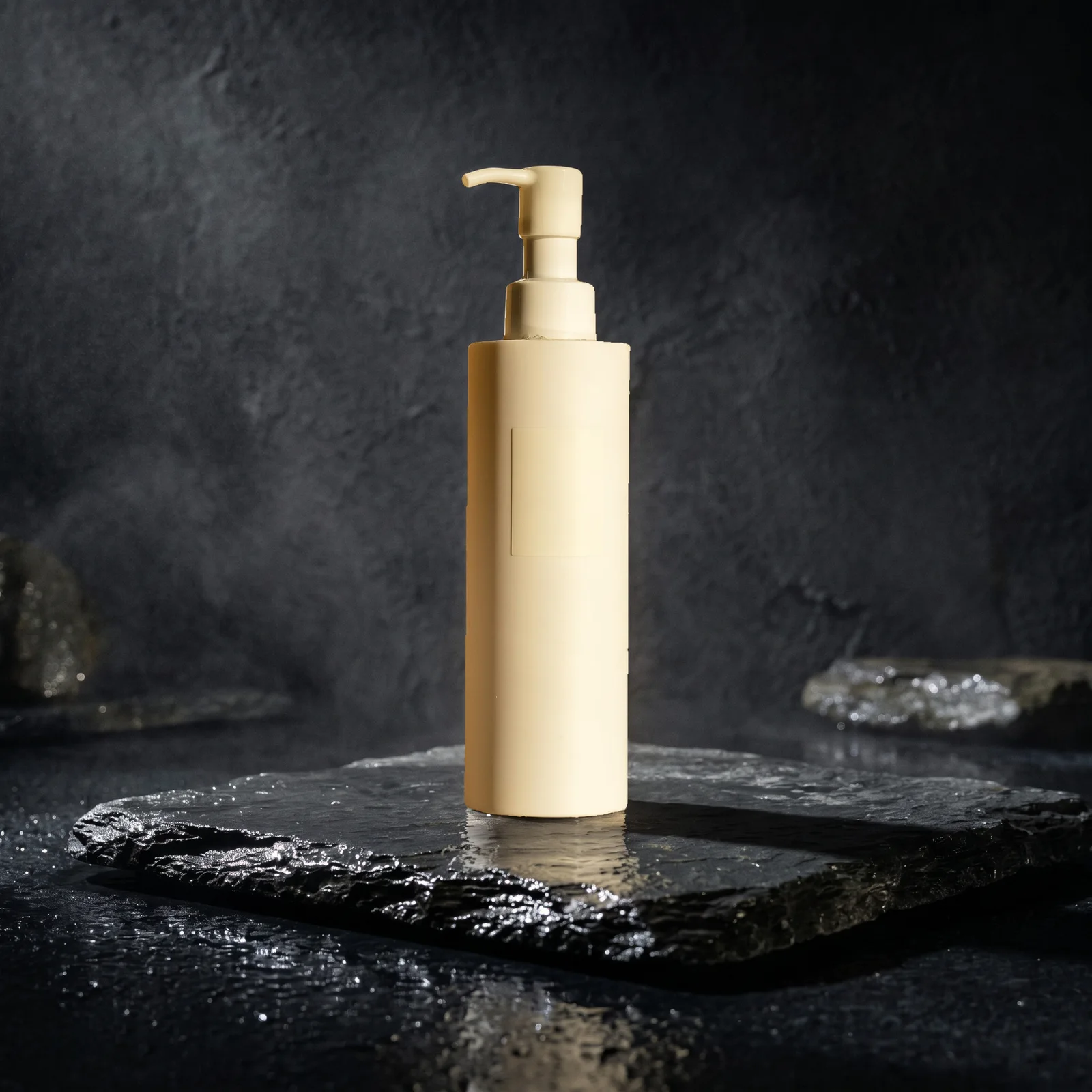 after: unbranded skincare bottle on wet slate