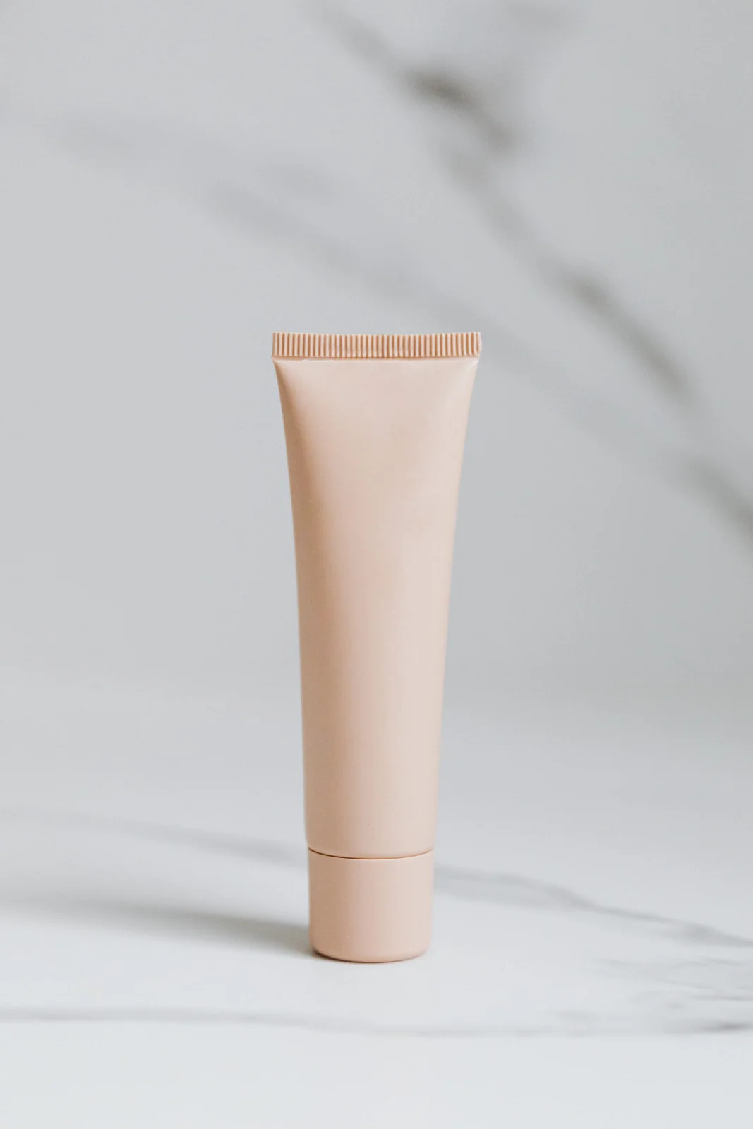 before: unbranded skincare tube in its original setting