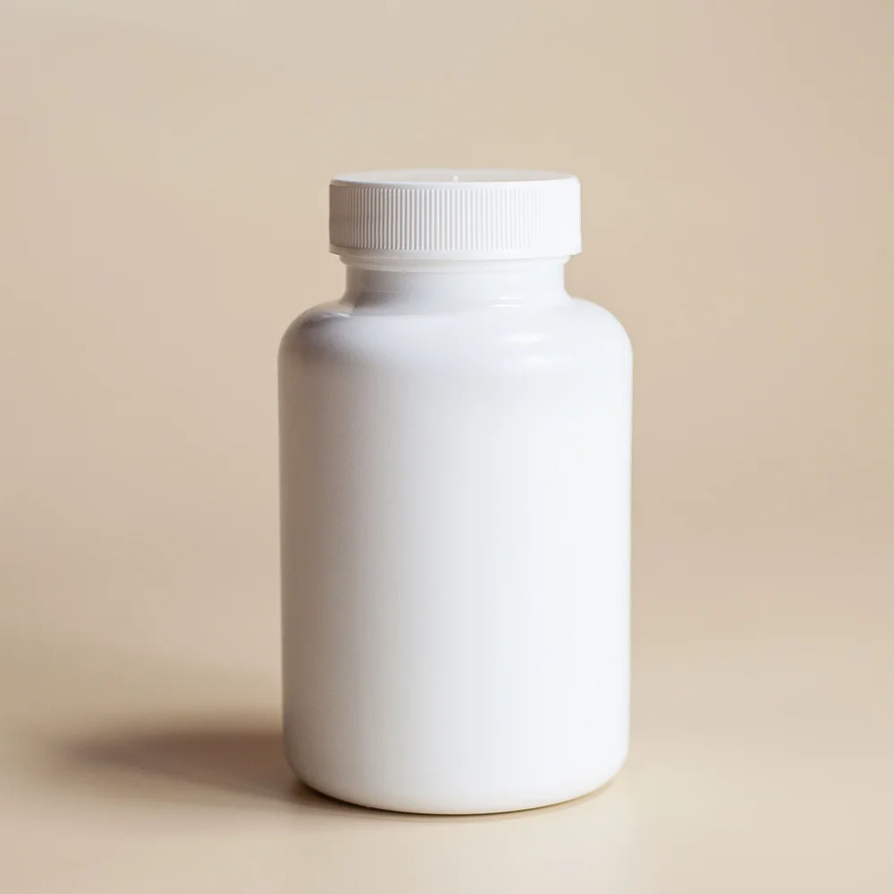 before: small unbranded white bottle photo