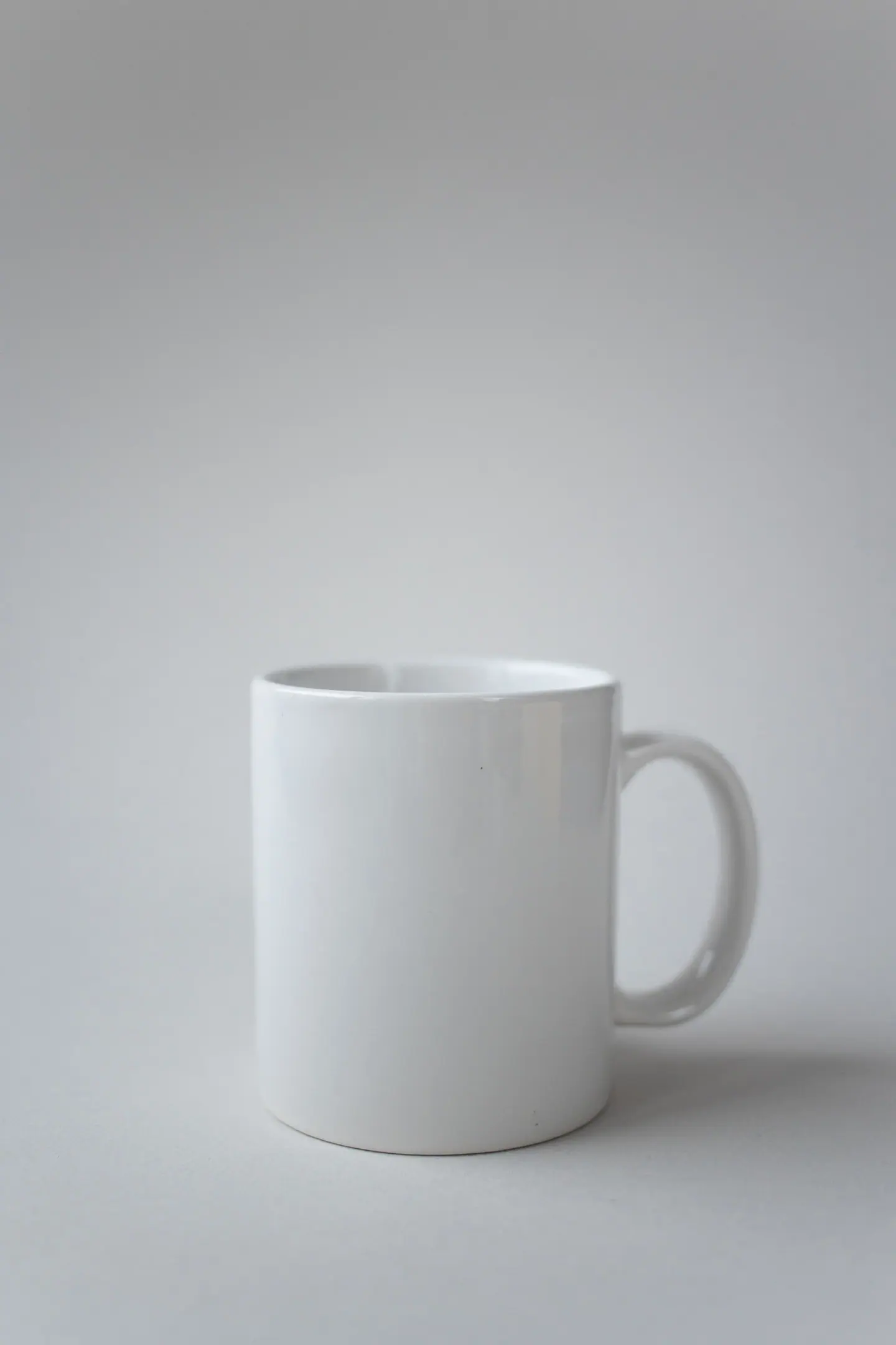 white ceramic mug photographed on a plain white background