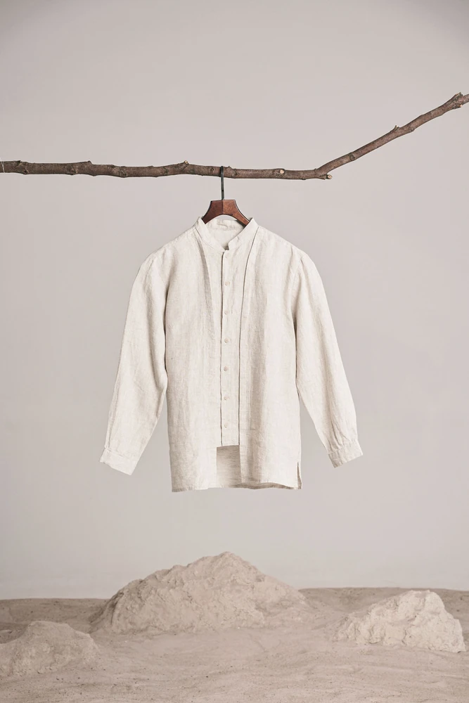 before: detail crop of the original shirt photo around the buttons