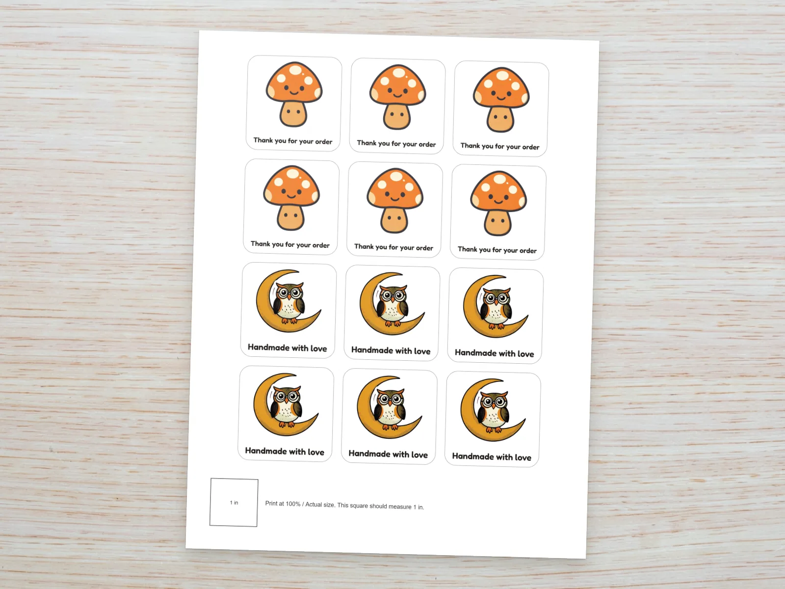 Letter sheet with six mushroom and six owl stickers, grey cut lines and 1-inch calibration square