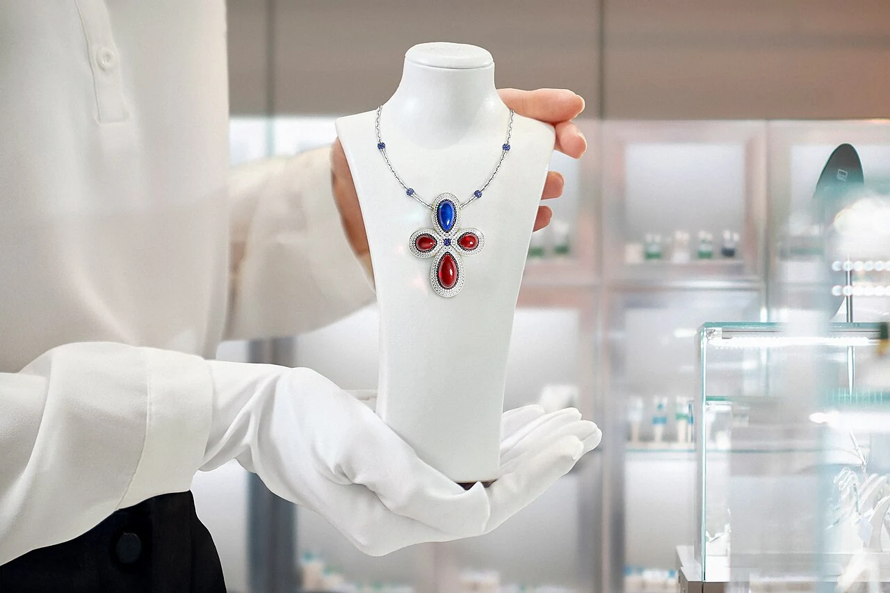 Gemstone necklace on a display bust